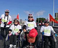 励志！乐清“钢铁女侠”坐着轮椅“跑”完马拉松，现在有机会能站起来……